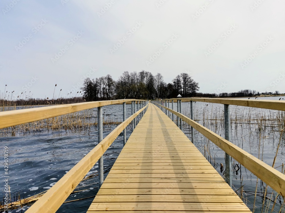 wooden bridge over the lake