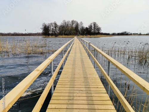 wooden bridge over the lake © Sandris