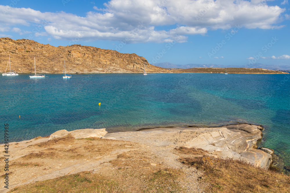 View of the rocky coast at Monasteri Beach. Paros Island, Greece.
