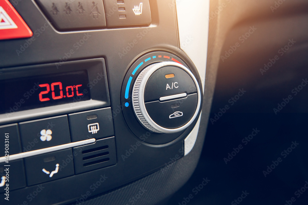 Switcher of air conditioning in the car. Button to turning on car climate  control system. Close up view with selective focus. Stock-Foto | Adobe Stock