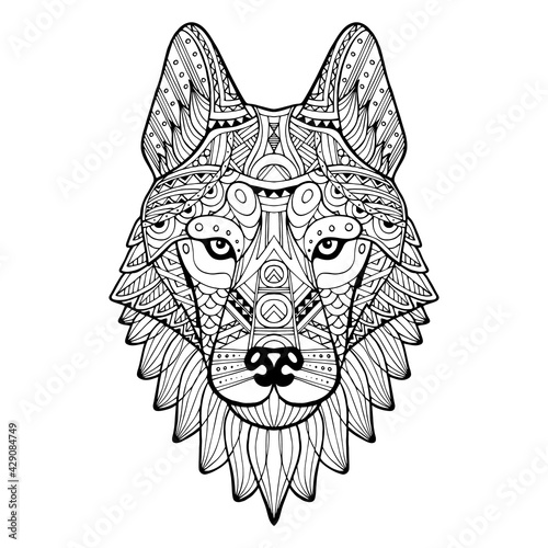 Patterned head of a wolf, husky, dog monochrome. Abstract ethnic image of the head of a wolf with tribal ornament. The ornament is painted by hand. A series of animals in the ethnic style. Vector