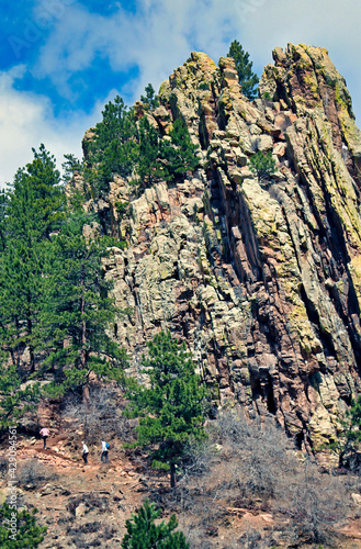 Hikers head up Mount Sanitas in Boulder, Colorado photo