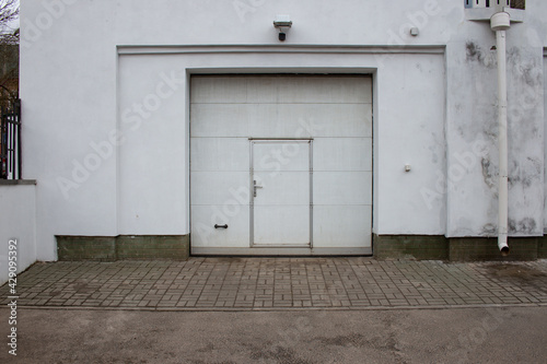 Rolling garage doors in white