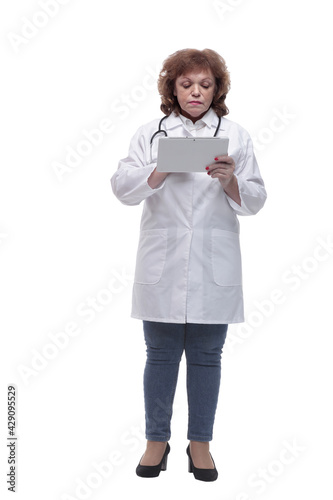 in full growth. female doctor with a digital tablet.