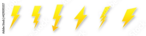 Electric lightning discharges icons. Bolt flashes with yellow geometric curves high voltage hazard and powerful vector charge thunderstorm.