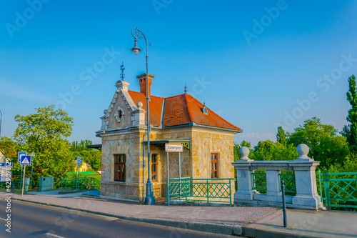 view of a customs house situated on the maria valeria bridge between esztergom and Sturovo in Hungary photo