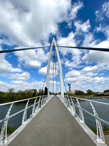 Wichita, Kansas: The Keeper of the Plains is a 44-foot, 5-ton weathered steel sculpture by Kiowa-Comanche artist Blackbear Bosin at the confluence of the Arkansas and Little Arkansas rivers.