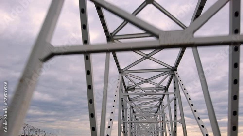 Slow motion footage of metal latticework overhead construction on the central part of Chesapeake Bay Bridge, a.k.a William Preston Lane Memorial bridge, connecting  DC region to eastern shore Maryland photo