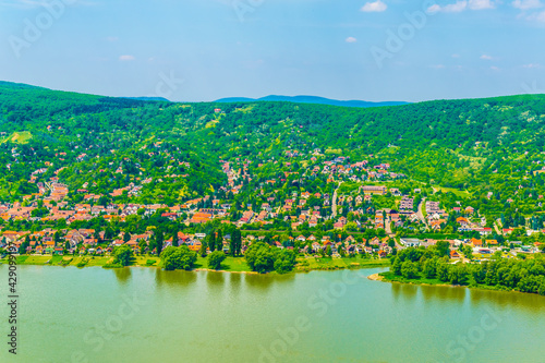 view of Nagymaros town situated on the opposite shore of the visegrad castle and next to the danube river in Hungary photo