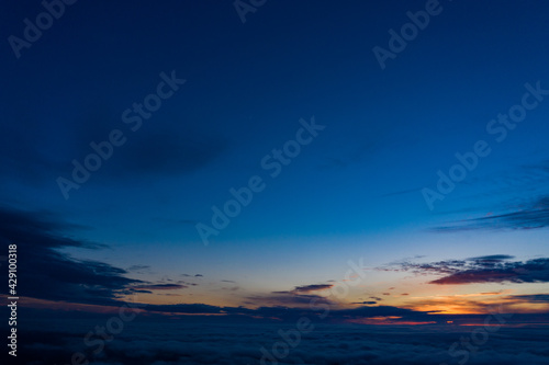 Fototapeta Naklejka Na Ścianę i Meble -  sunrise on blue sky. Blue sky with some clouds