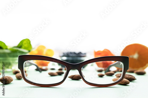 Modern fashionable corrective optical  glasses close-up against the background of that improve vision.