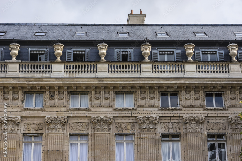 Architecture of ancient buildings in public garden of Palais-Royal Palace. Palais-Royal (1639, originally - Palais-Cardinal) was personal residence of Cardinal Richelieu. Paris.