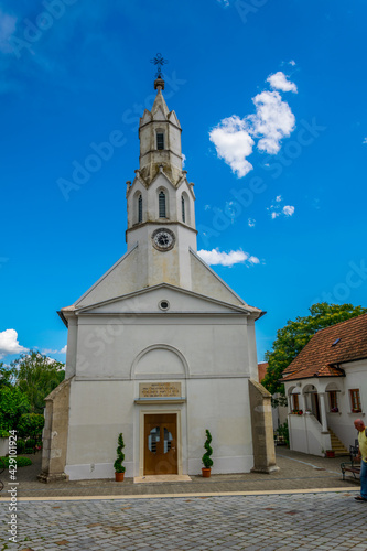 View of a white church situated in morbisch am see village near neusiedlersee in Austria. photo