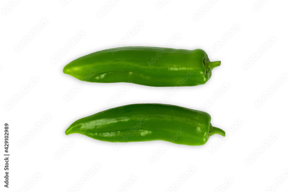 Two fresh green pepper isolated on a white background