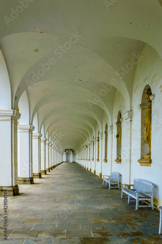 view of a white arcade situated in the Kvetna zahrada garden in Kromeriz enlisted as the unesco world heritage site. photo