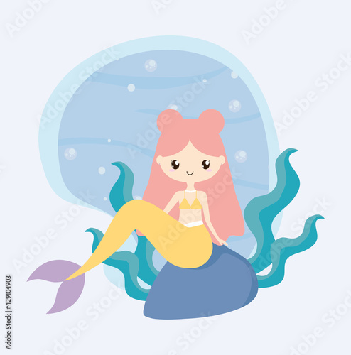 mermaid sitting underwater