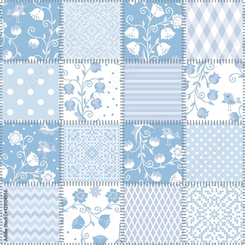 Seamless patchwork pattern with beautiful floral and geometric ornament in light blue colors. Quilt design in country style.
