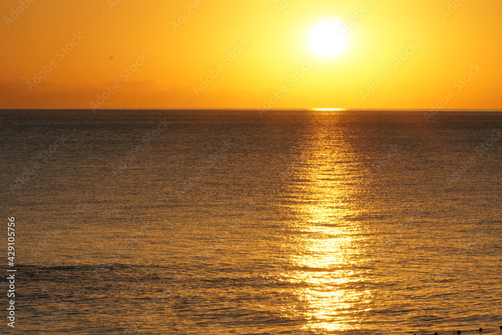 Sunrise over the calm sea