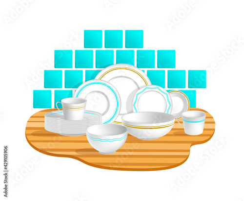 Set white and clean porcelain elegant different Dishes with stacks of Plates and Cups on background of blue tiles, on a wooden table. Concept Kitchen tools, table setting. Decorative Decoration Plates