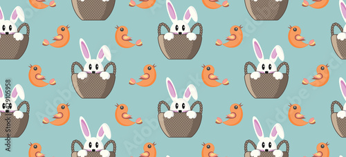 Seamless pattern with cute bunny sitting in a basket and a flying bird, vector

