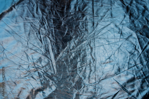 The texture of the foil is silvery mirror color. Copy space.