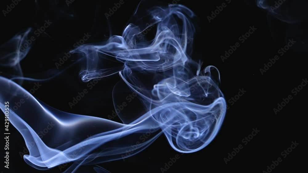 Realistic smoke on a black background. Soft fog, abstract cloud of haze, animation fog effect in slow motion. Close up. Realistic smoke on a black background. Soft fog, abstract cloud of haze, animation fog effect in slow motion. Close up.