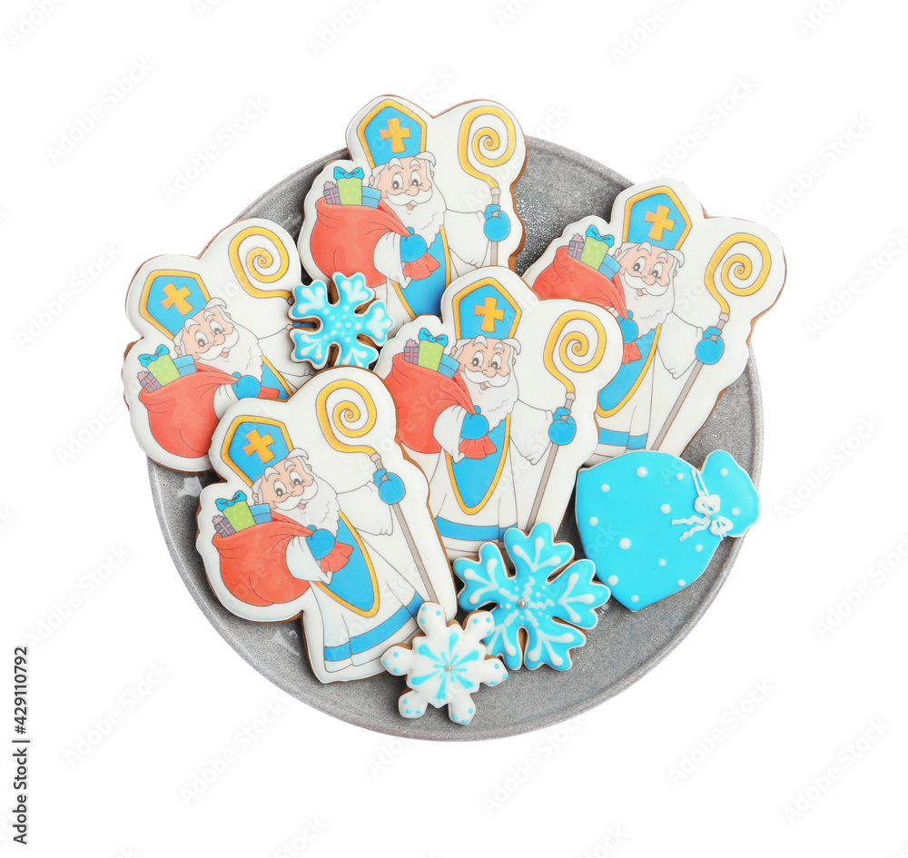 Tasty gingerbread cookies on white background, top view. St. Nicholas Day celebration