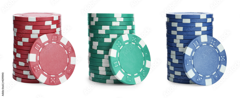 Fototapeta premium Set with stacks of different casino chips on white background, banner design. Poker game
