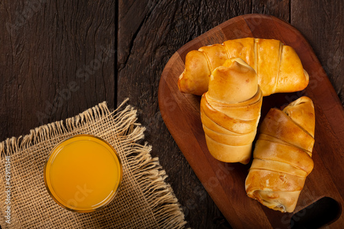 Traditional fresh baked croissants on the table. photo