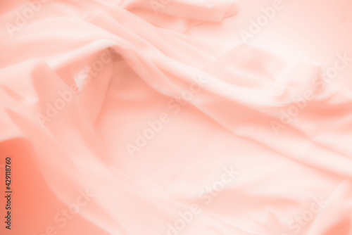 Peach satin cloth texture background