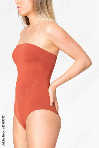 Strapless orange swimsuit women's summer apparel with design space rear view