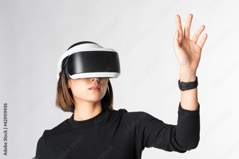 Woman playing a virtual video game on virtual screen Woman playing a virtual video game on virtual screen