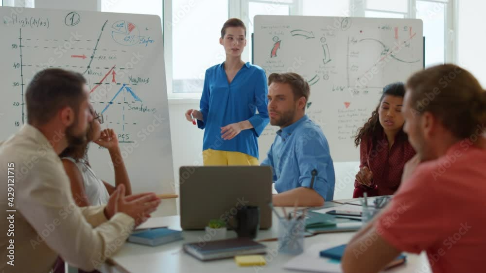 Business woman brainstorming team office. Serious people discussing meeting room Business woman brainstorming team office. Serious people discussing meeting room