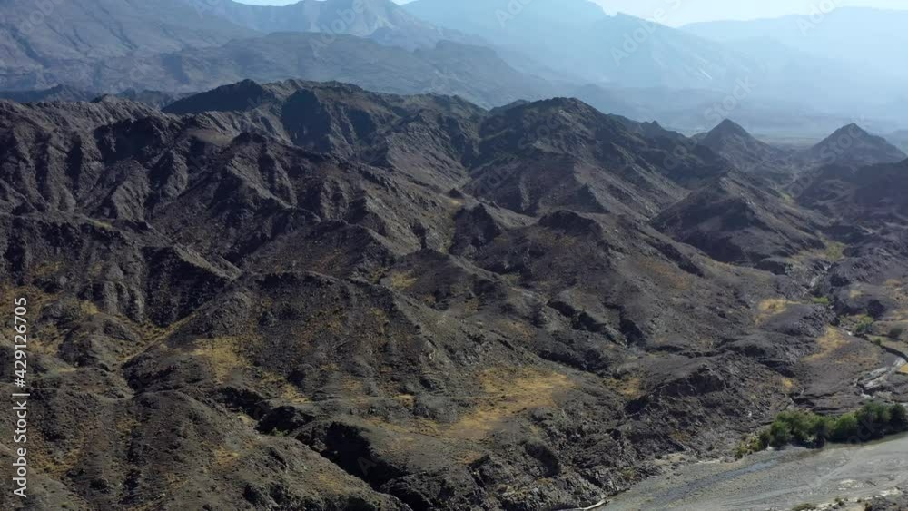 Aerial view of Al Hajar Mountains or The Rocky Mountains at Al Rustaq in Oman Aerial view of Al Hajar Mountains or The Rocky Mountains at Al Rustaq in Oman