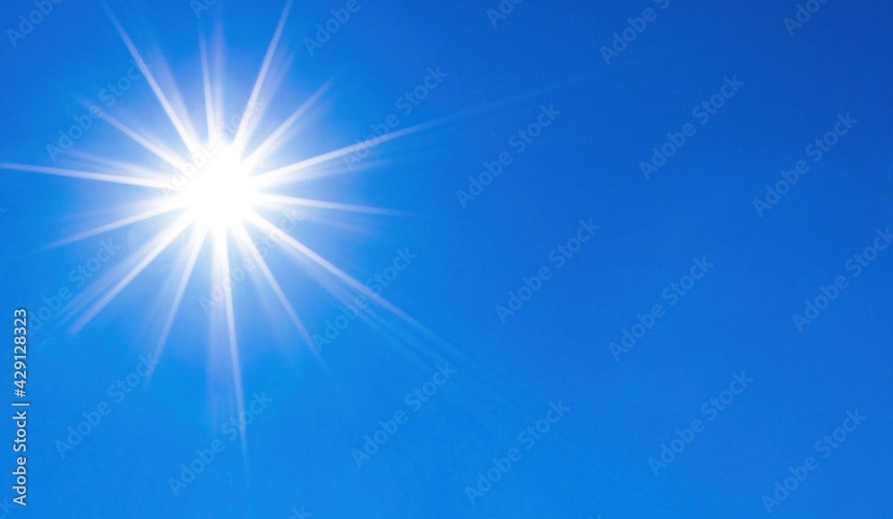 Shining sun over perfect blue sky background Shining sun over perfect blue sky background