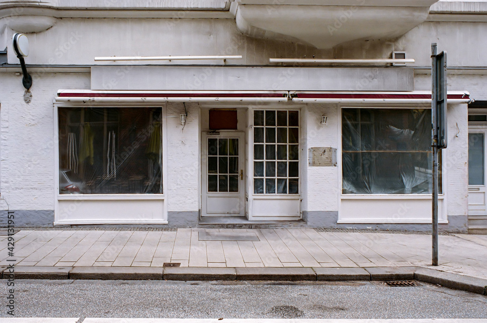 closed and locked restaurant, shop front, impact of the coronavirus pandemic 2021. closed and locked restaurant, shop front, impact of the coronavirus pandemic 2021.