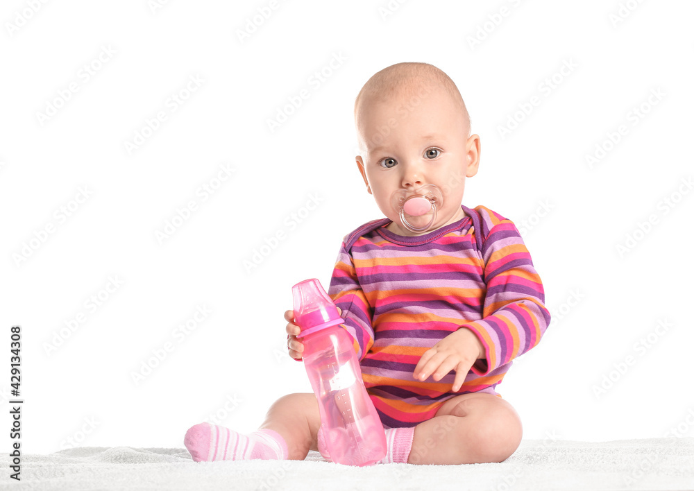 Cute little baby with bottle of water on white background Cute little baby with bottle of water on white background