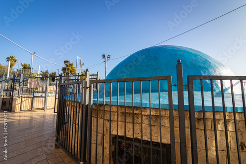  The dome painted blue above the building inside is the tomb of Rabbi Shimon Bar Yochai in Meron-Israel