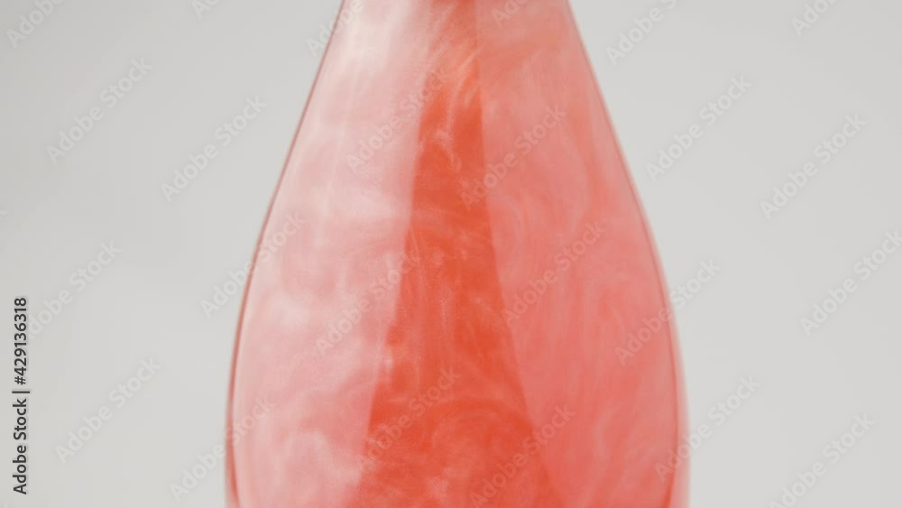 Sparkling  champagne glass with bubbles on white background. Closeup shot of champagne bottle. champagne glass on white background. 