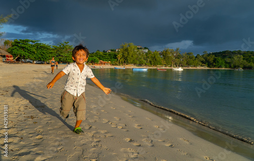 child playing on the beach