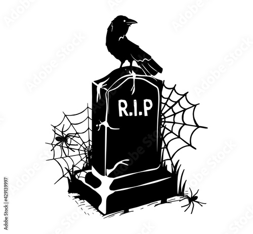 Fototapeta silhouette of a headstone with a crow
