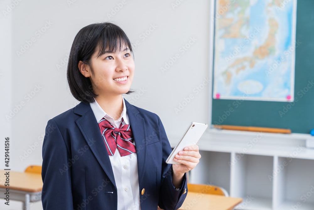 女子学生　スマホ　教室
