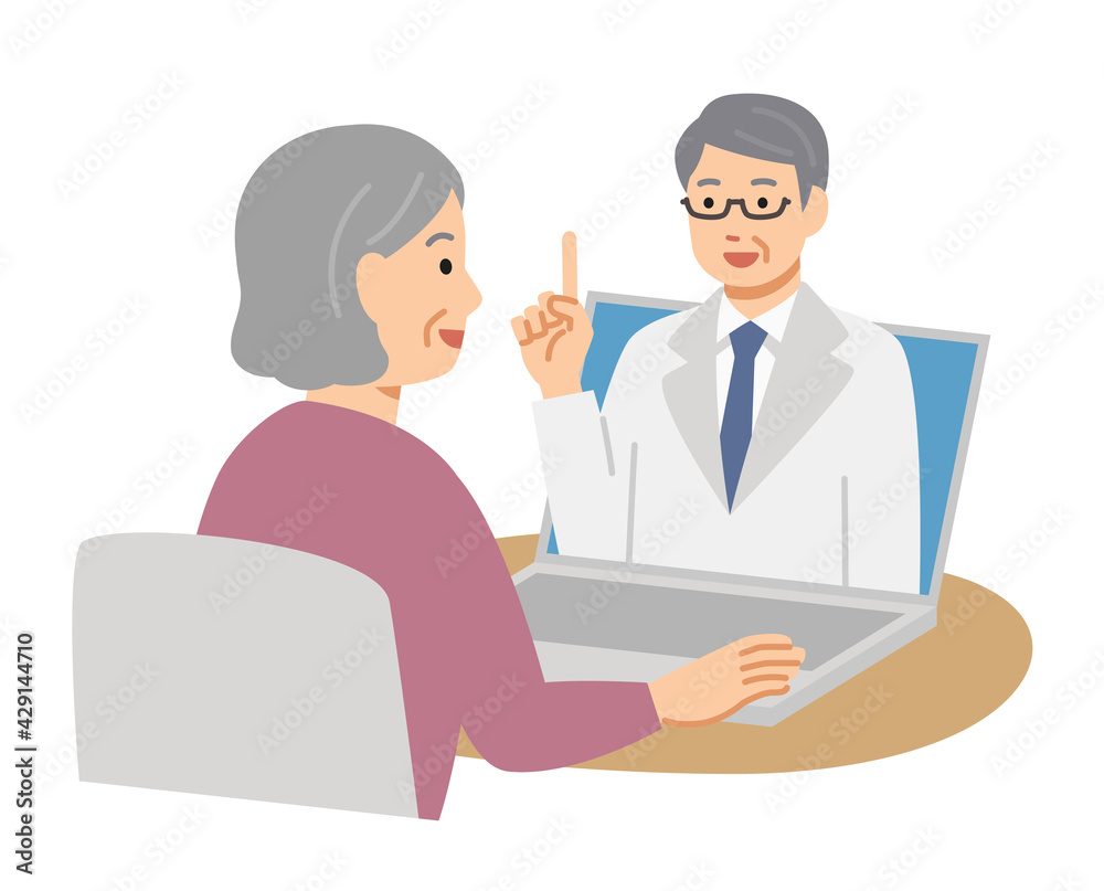 パソコンでオンライン診療を受ける笑顔のシニア女性 パソコンでオンライン診療を受ける笑顔のシニア女性
