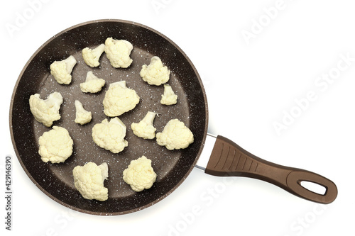 Raw cauliflower in frying pan isolated on white background, healthy food concept, diet