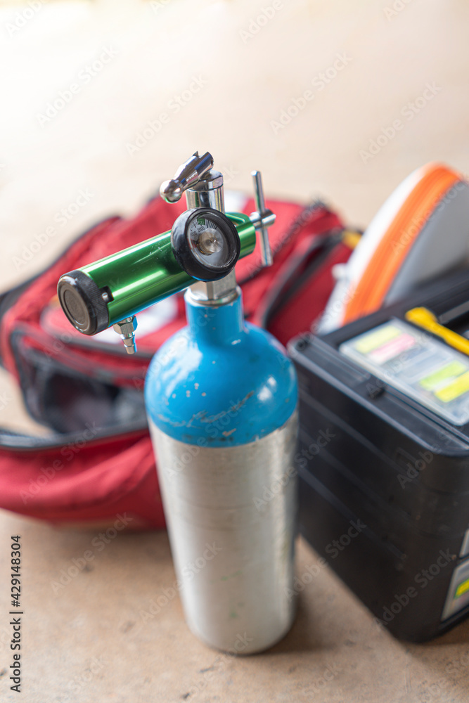 The oxygen cylinder for medical use is placed on the floor. While practicing emergency nursing The oxygen cylinder for medical use is placed on the floor. While practicing emergency nursing