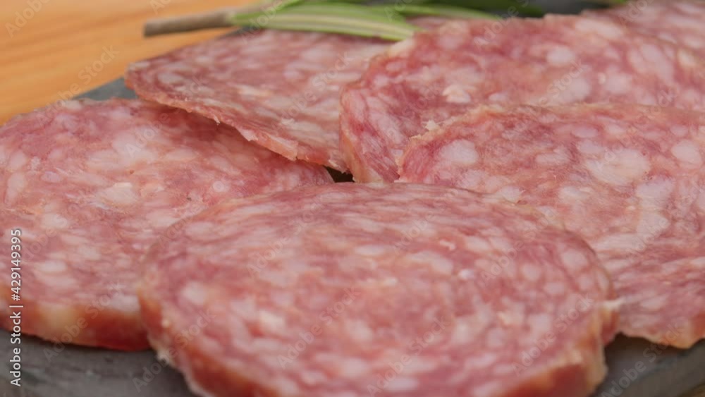 sliced sausages rotation. Sliced salami rotates. Smoked sausage slices. Salami Rotating. Sausage isolated. sliced sausages rotation. Sliced salami rotates. Smoked sausage slices. Salami Rotating. Sausage isolated.
