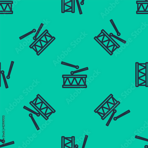 Blue line Drum with drum sticks icon isolated seamless pattern on green background. Music sign. Musical instrument symbol. Vector