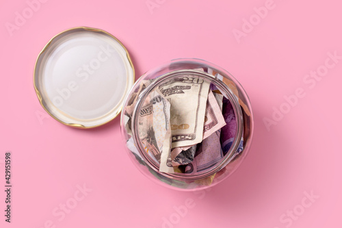 Slika na platnu American dollars in glass money jar,top view, financial, saving