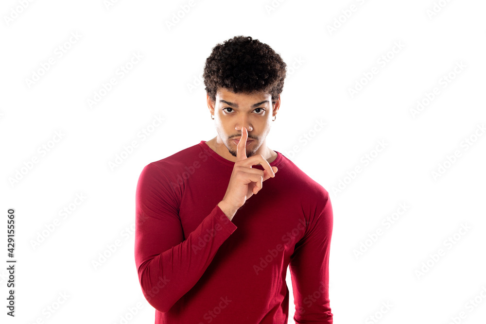 Cute african american man with afro hairstyle wearing a burgundy T-shirt Cute african american man with afro hairstyle wearing a burgundy T-shirt