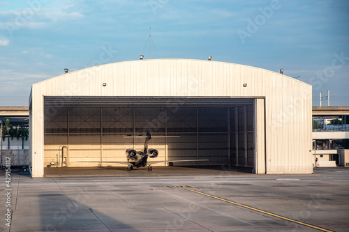 Fotografia Aircrafts parking inside the hangar in airport